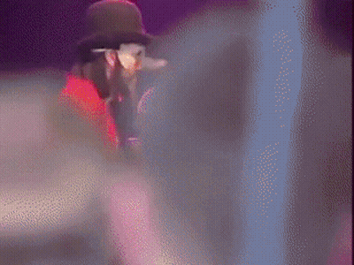 Yellow Guitarist Next To Red Shirt Man GIF