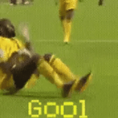 Yellow Jersey Soccer Player Laying On Ground GIF