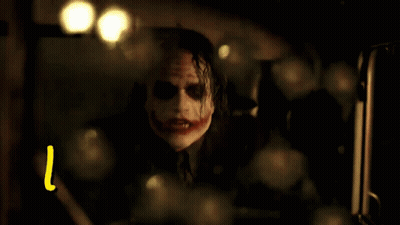 Yellow Letter L Next To Joker In Car GIF
