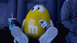 Yellow M&Ms Feed Me GIF