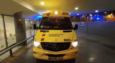 Yellow Mercedes Ambulance With Emergencyes Mediques GIF