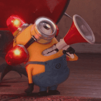 Yellow Minion Holding Megaphone And Boxing Gloves GIF
