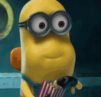 Yellow Minion Holding Popcorn GIF
