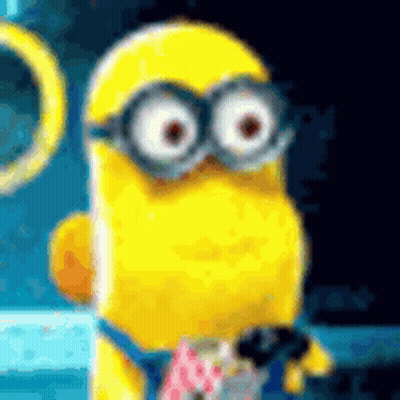 Yellow Minion Wearing Glasses Holding Microphone GIF