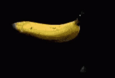 Yellow Object Cut In Half With Knife GIF