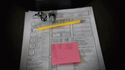 Yellow Pencil And Pink Sticky Note On Paper GIF