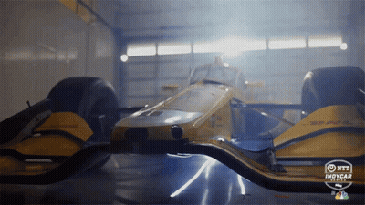 Yellow Race Car In Garage GIF