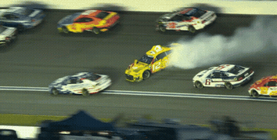 Yellow Race Car With Number 12 GIF