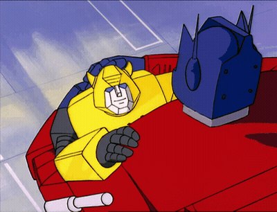Yellow Robot Laying On Top Of Red One GIF