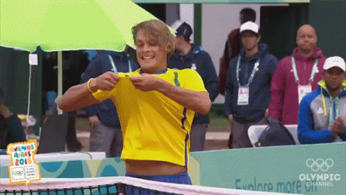 Yellow Shirt Man Selfie Green Umbrella Olympic Banner GIF