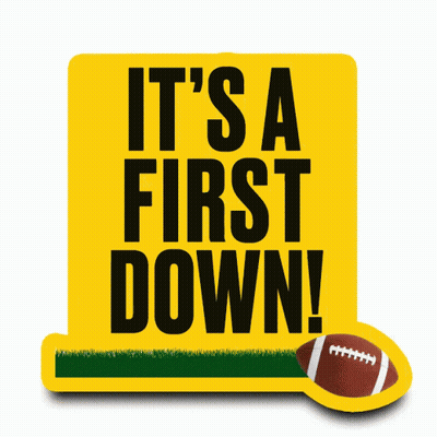 Yellow Sign Saying It's a First Down