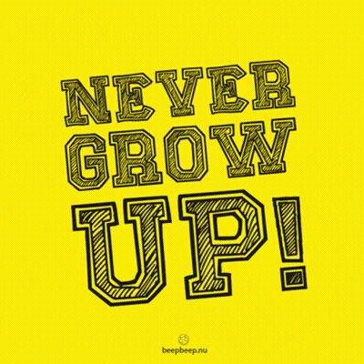 Yellow Sign Saying Never Grow Up GIF