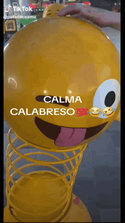 Yellow Smiley Ball Saying Calma Calabreso GIF