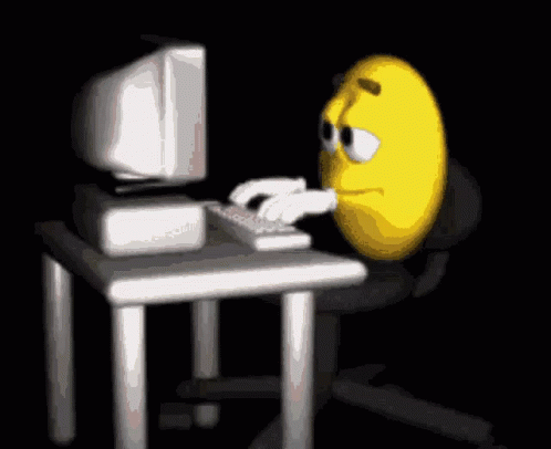 Yellow Smiley Face Typing On Keyboard GIF