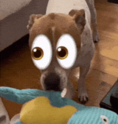 Yellow Smiley Face With Two Holes GIF