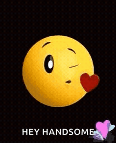 Yellow Smiley Holding Heart Says Hey Handsome GIF