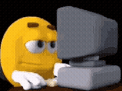 Yellow Smiley Looking At Computer Monitor GIF