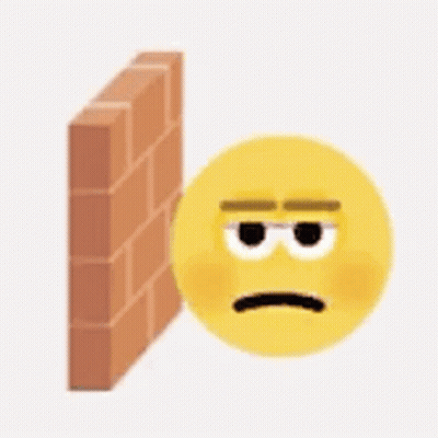Yellow Smiley Sad Face Beside Brick Wall GIF