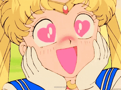 Yellow Smiley With Red Heart Eyes On Pink Background GIF