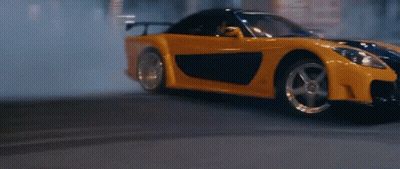 Yellow Sports Car Driving At Night GIF