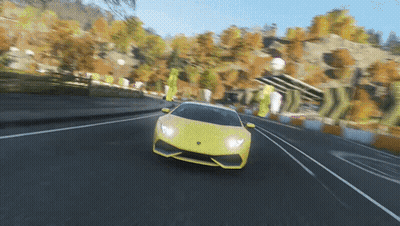 Yellow Sports Car Driving Down Road GIF