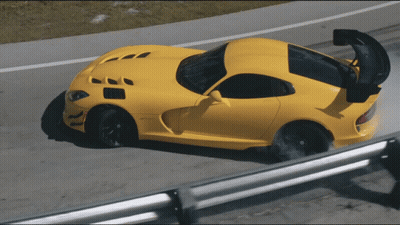 Yellow Sports Car Driving With Trunk Open GIF