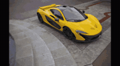 Yellow Sports Car On Steps GIF