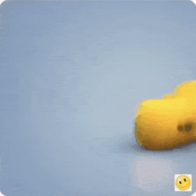 Yellow Stuffed Animal Walking With Smiley Face GIF