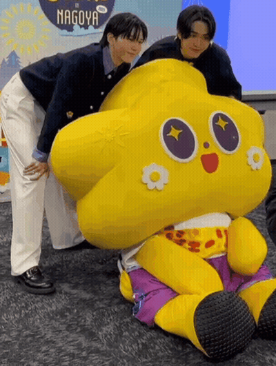 Yellow Stuffed Animal With Purple Pants GIF