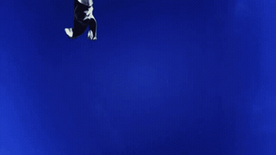 Yellow Teddy Bear On Grass Hill GIF