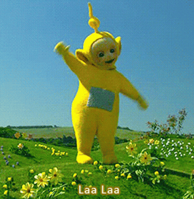 Yellow Teletubbies Character In Yellow Flowers GIF