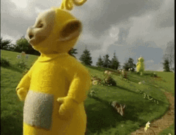 Yellow Teletubby Laalaa Searching GIF