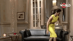 Yellow Tight Dress Ruhi Chaturvedi Sitting On Sofa GIF