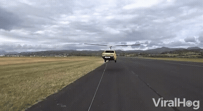 Yellow Truck Towed By Helicopter ViralHog GIF