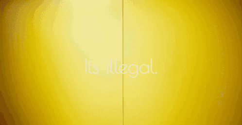 Yellow Wall Saying It's Illegal GIF