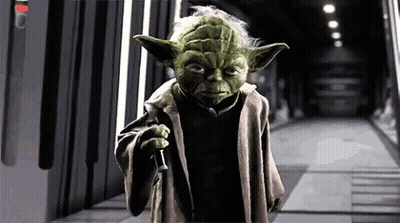 Yoda From Star Wars Holding Lightsaber GIF