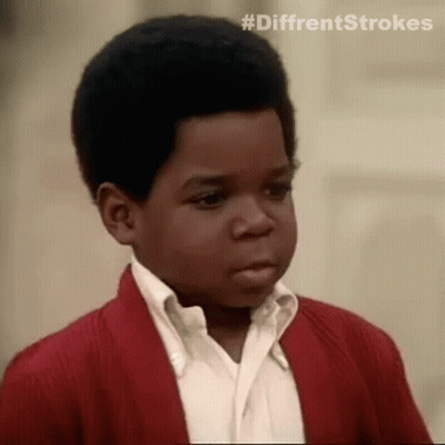 Young Black Boy In Red Sweater Making Funny Face GIF