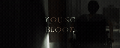 Young Blood In Gold Letters On Dark Background GIF