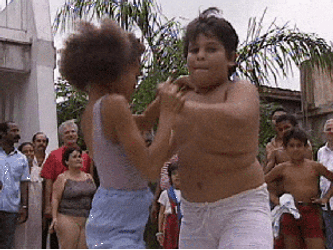 Young Boy And Girl Performing Salsa GIF