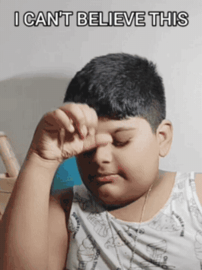 Young Boy Covering Eyes Saying I Can't Believe This GIF