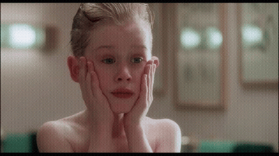 Young Boy Covering Face GIF