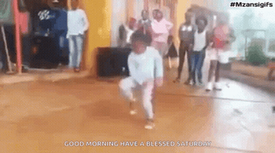 Young Boy Dancing With Group Behind Him GIF