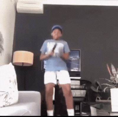 Young Boy Dancing With Wii Remote GIF
