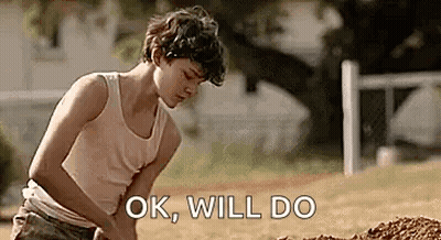 Young Boy Digging In Dirt GIF