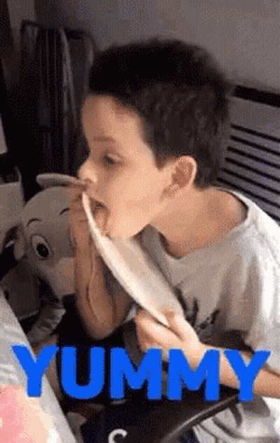 Young Boy Eating Yummy Food GIF