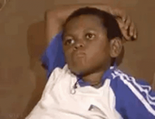 Young Boy Eyes Closed Hands On Head GIF