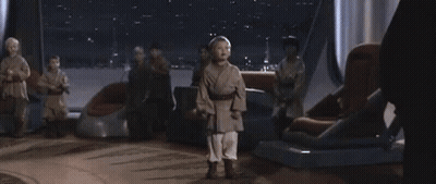 Young Boy Holding Light Saber GIF