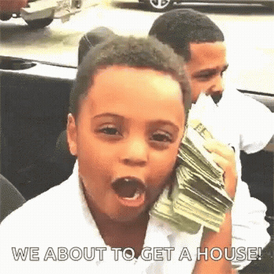 Young Boy Holding Money In Mouth Talking On Phone GIF
