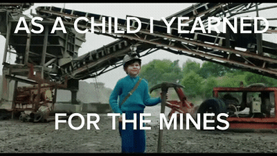 Young Boy Holding Pickaxe And Hammer At Conveyor Belt GIF