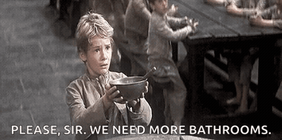 Young Boy Holding Soup